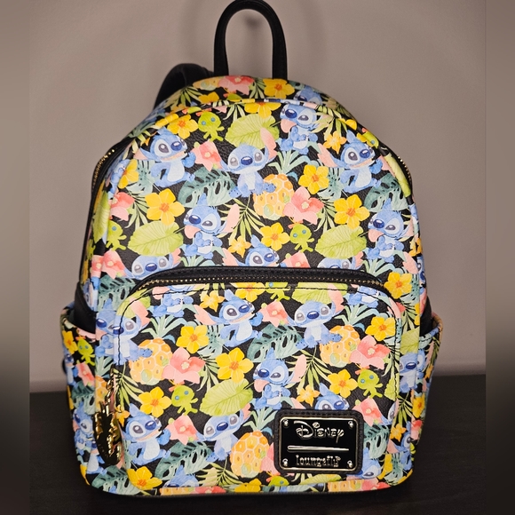Disney Handbags - Loungefly 🎉HOST PICK🎉  Disney Stitch & Scrump Floral Watercolor Mini Backpack